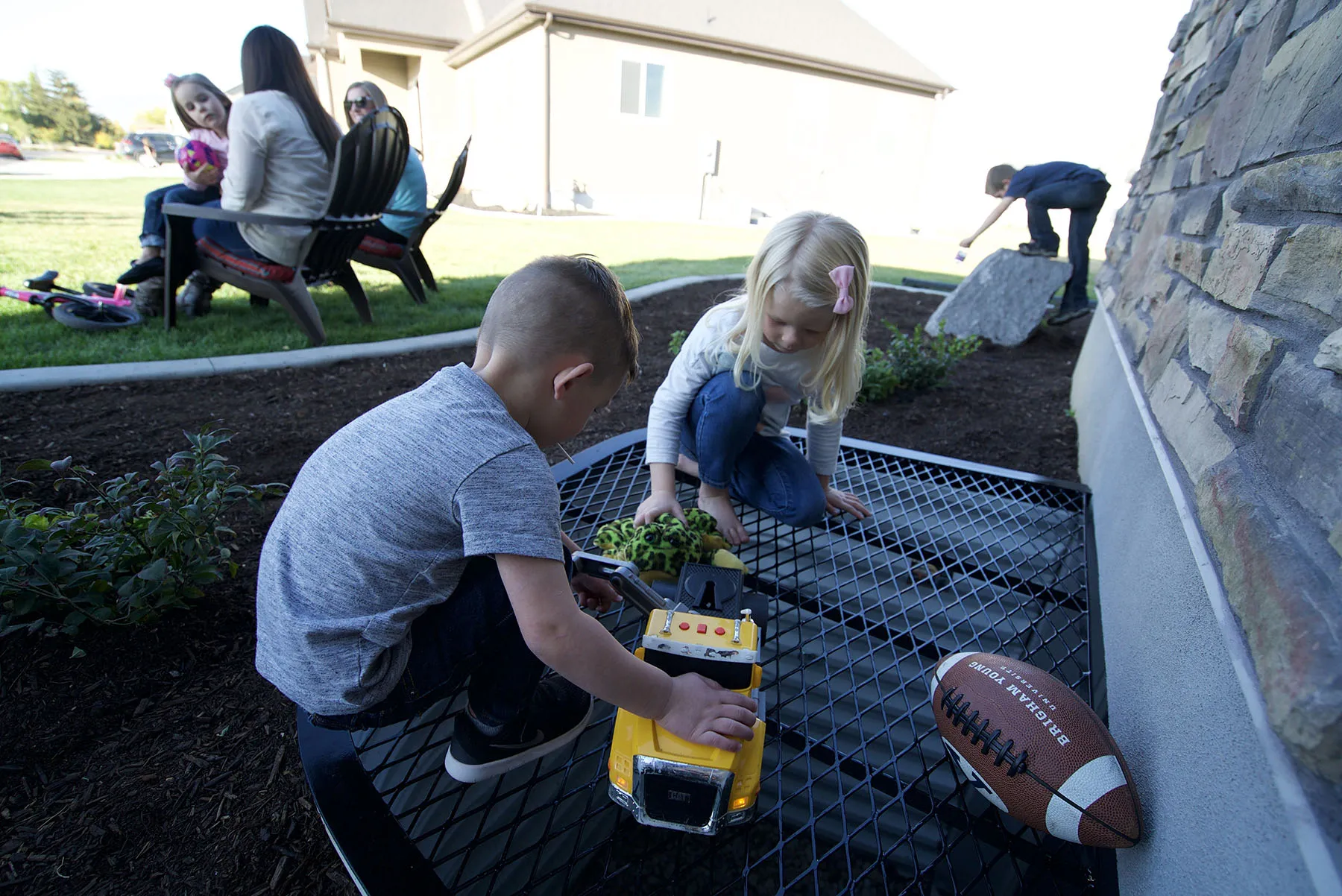 Steel window well cover with kids